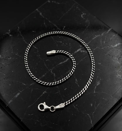 Chain the Men Black Silver Mens 3mm Curb Bracelet - Bat Design